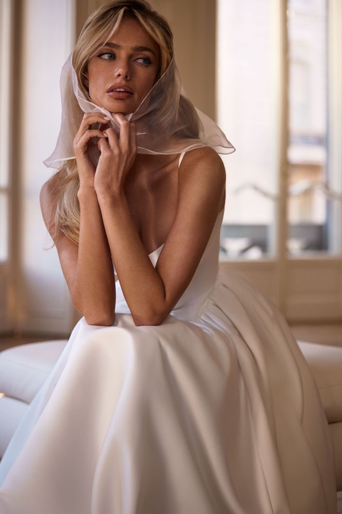 Delmora suknie